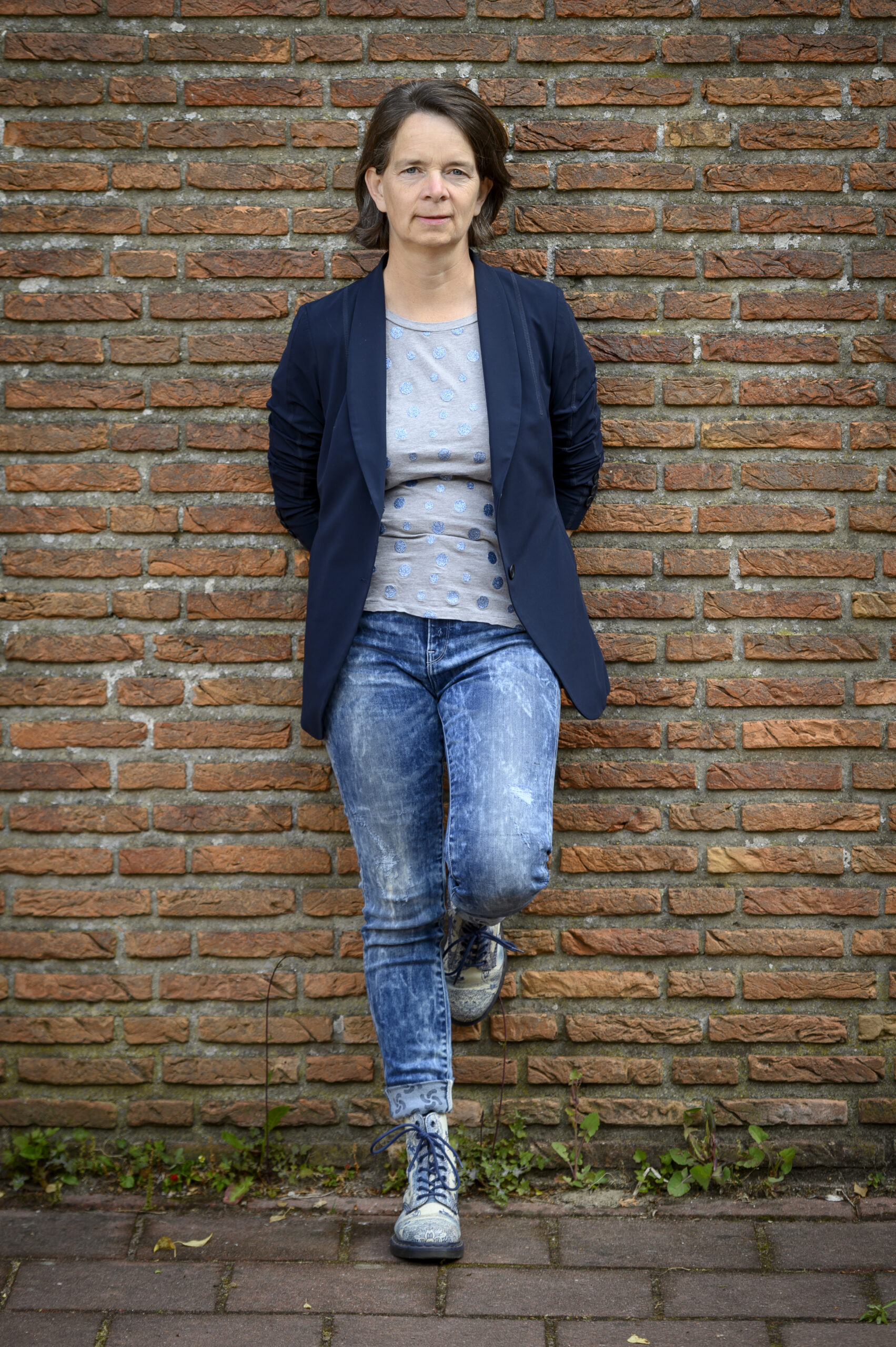 Business coach voor ZZP en hoogbegaafd - Ellen de Lange-Ros voor muur